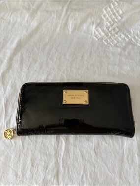 Michael Kors Black Patent Zip Around Wallet with Gold Plaque